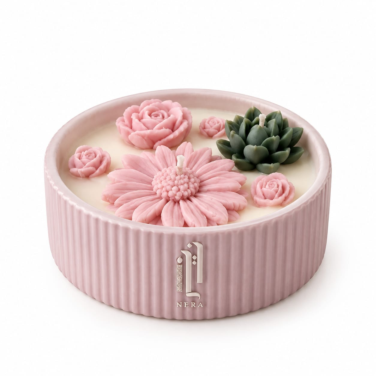 NÉRA Floral Garden candle, a pink ribbed vessel topped with wax roses, a daisy and a succulent