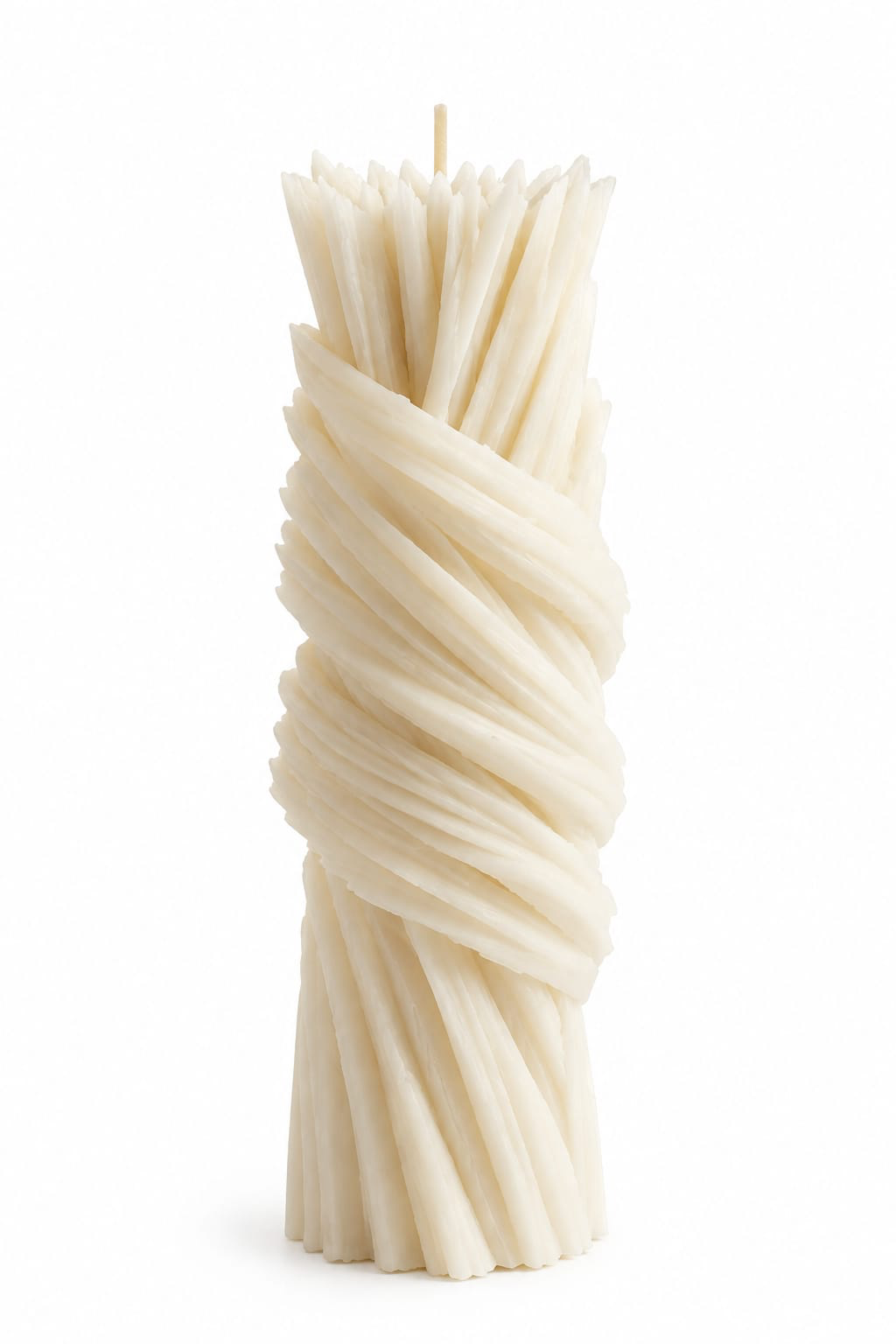 NÉRA Signature Spiral candle, a tall ivory pillar candle with a sculptural twisted spiral design