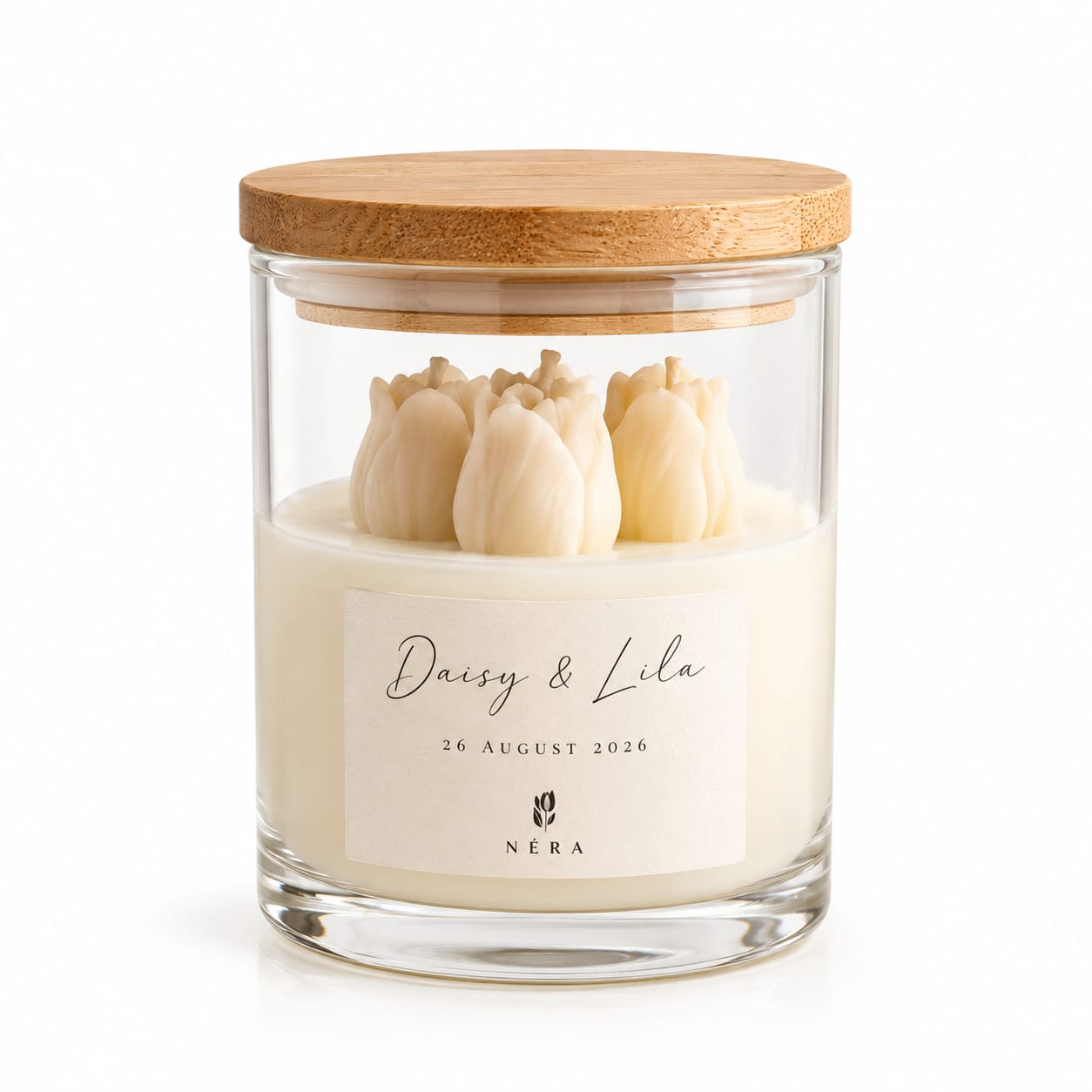 NÉRA tulip candle favor, a clear glass jar filled with ivory tulip-shaped candles under a natural wooden lid with a personalized event label
